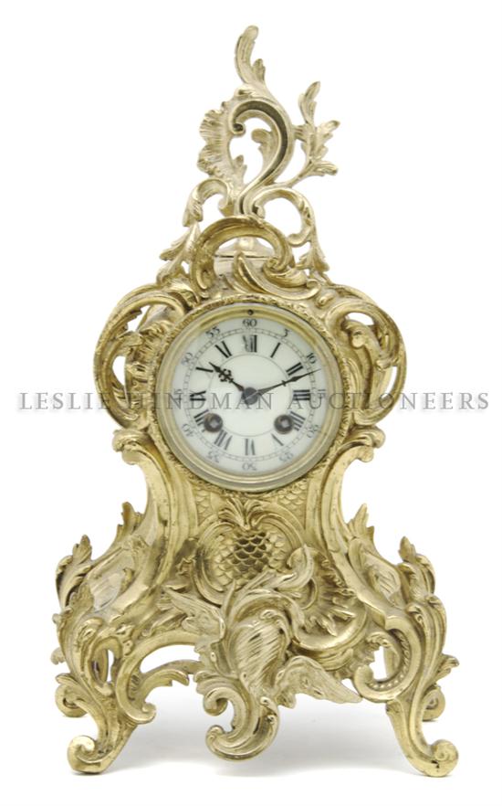 A Louis XV Style Brass Mantel Clock