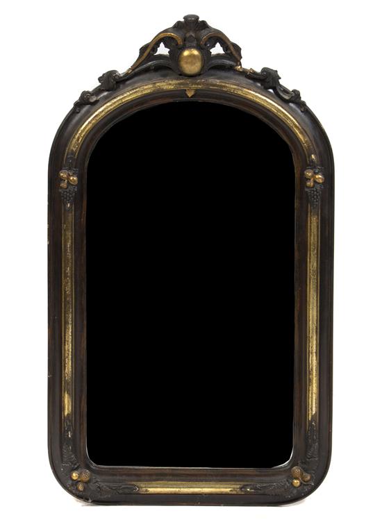 * A Victorian Ebonized and Parcel