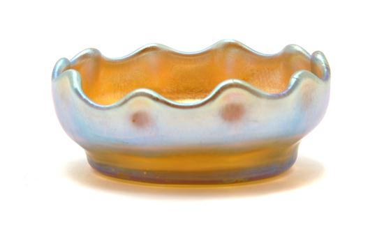 A Tiffany Favrile Glass Salt of circular