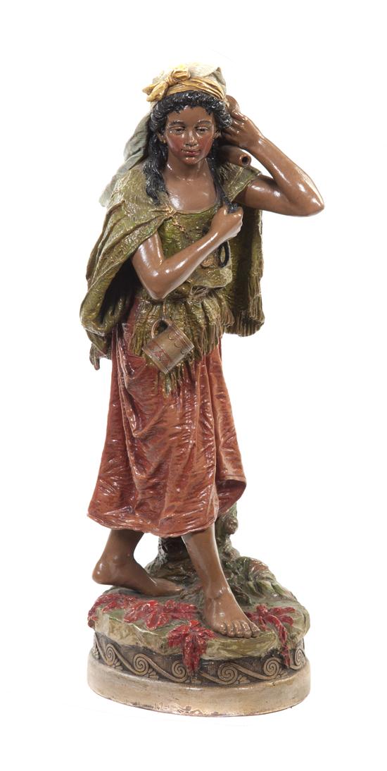 A Cast Plaster Figure depicting a maiden