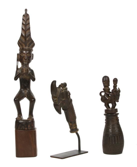 A Group of Three Carved Wood Figures