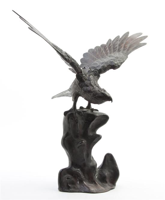 A Japanese Bronze Figure of a Hawk