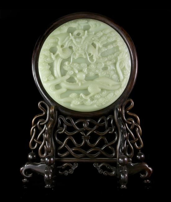 A Peking Glass Mounted Tablescreen
