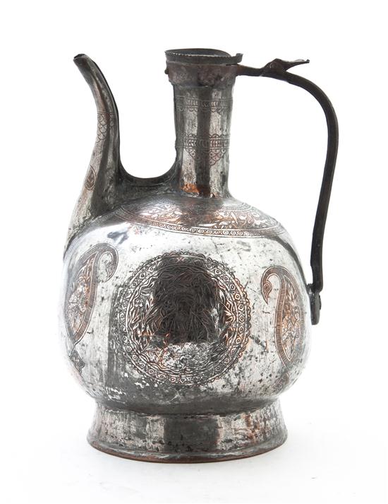 A Middle Eastern Silvered Copper Ewer