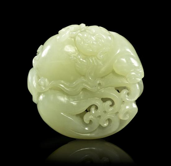 A Chinese Jade Toggle of circular 1540f9