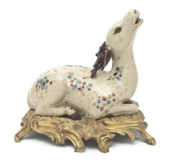 * A Gilt Metal Mounted Stoneware Model