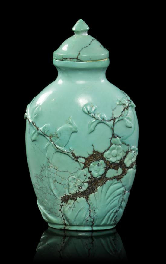 * A Carved Turquoise Snuff Bottle