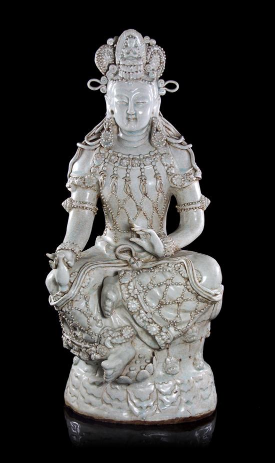 * A Chinese Qingbai Porcelain Figure