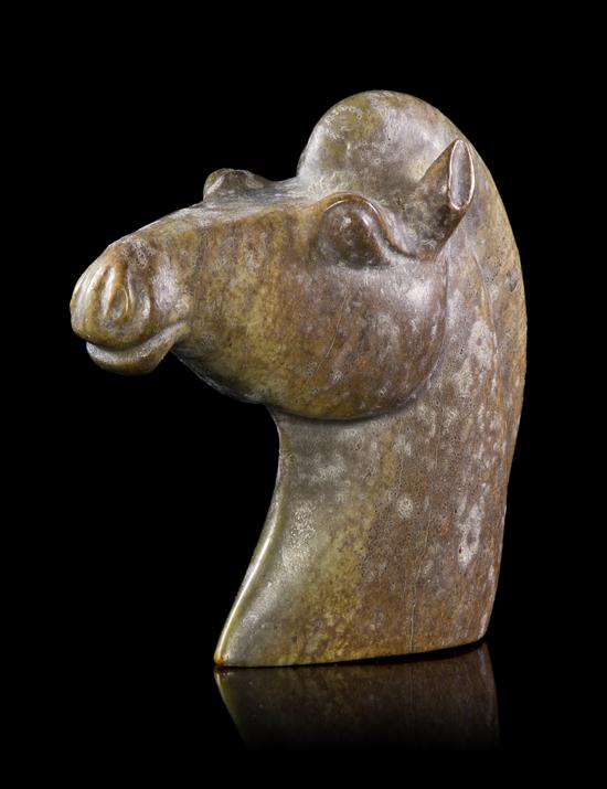 * A Chinese Nephrite Jade Horse Head