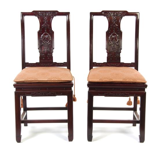 A Pair of Chinese Carved Hardwood