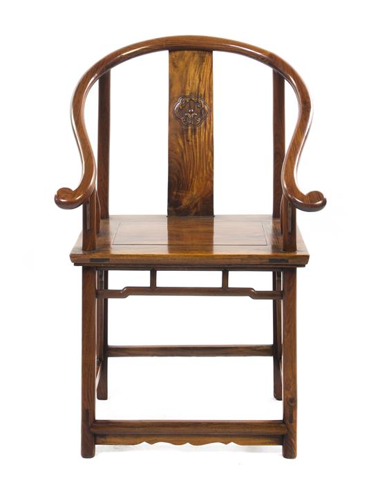 * A Huanghuali Horseshoe-Back Armchair