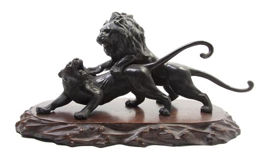 A Japanese Bronze Model of a Lion 154357