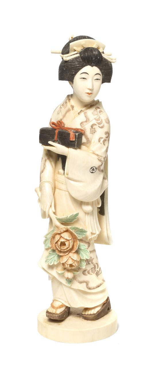 A Japanese Carved Ivory Okimono 154380