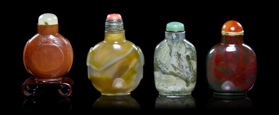 * A Group of Four Agate Snuff Bottles