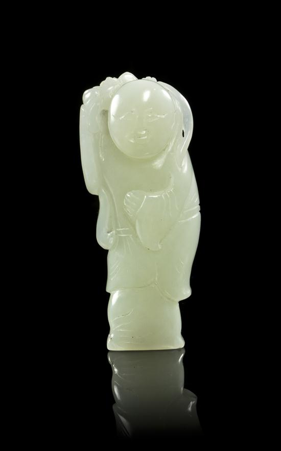 A White Jade Carved Figural Toggle