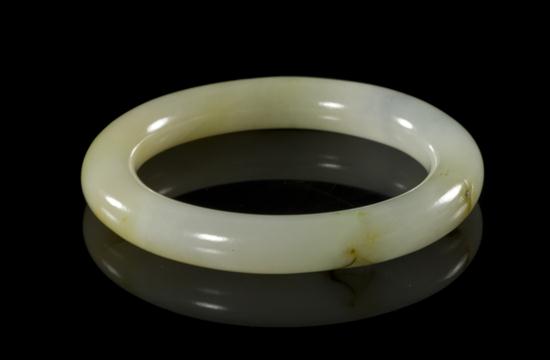 A Jade Bangle of a pale yellow stone