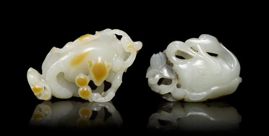 Two Carved Jade Toggles one depicting