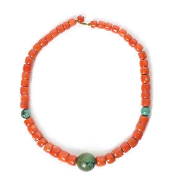 A Coral Necklace and Leather Case