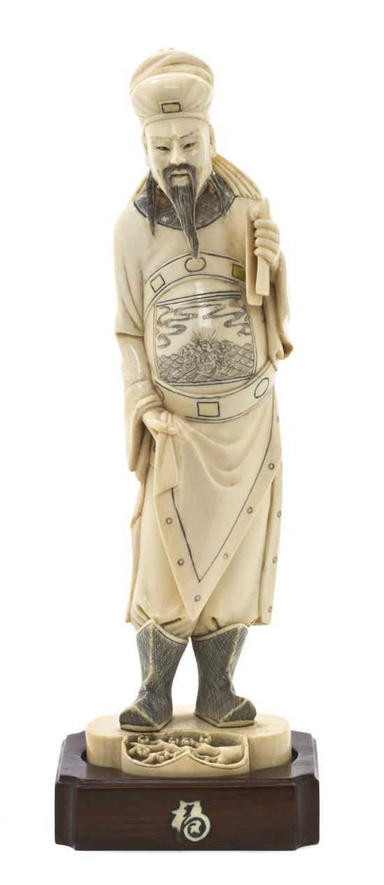 A Chinese Carved Ivory Figure of 154425