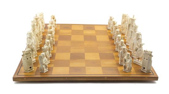 * A Chinese Carved Ivory Chess Set comprising