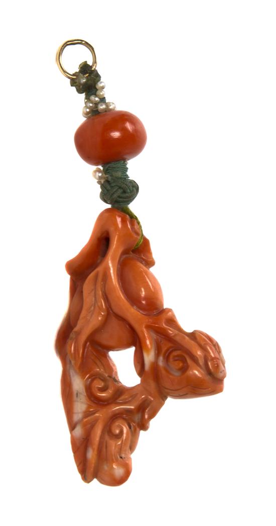 A Chinese Carved Coral Toggle in 15445a