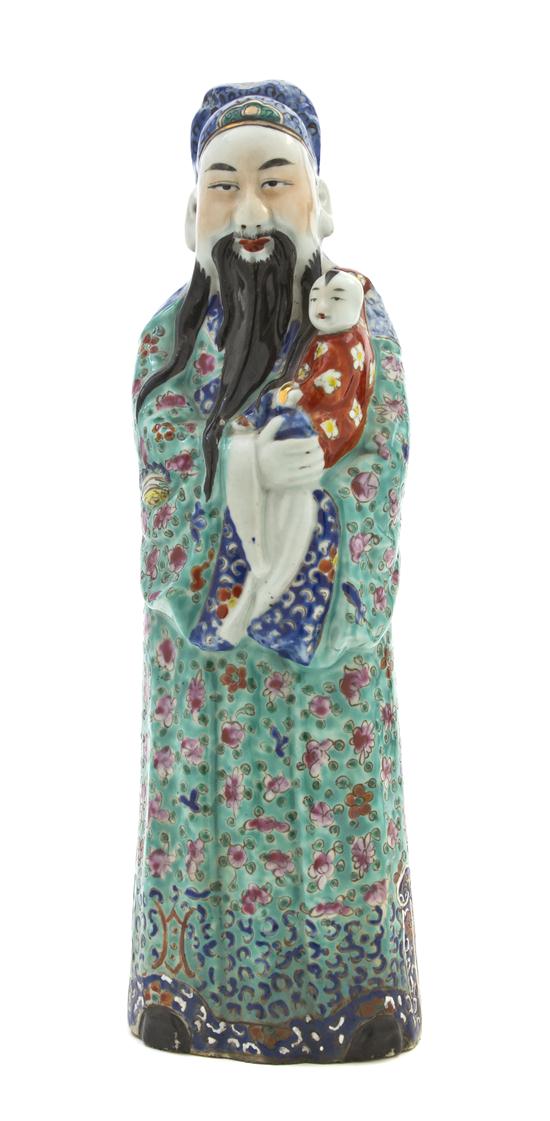 A Chinese Famille Rose Figure depicting 154457