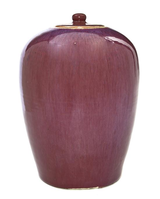 A Flambe Glazed Porcelain Lidded Jar