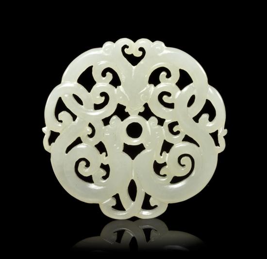 A Chinese White Jade Circular Plaque