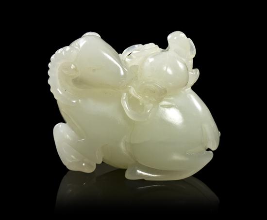 A White Jade Carved Ram Toggle