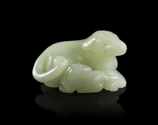 A Celadon Jade Carved Toggle depicting 15448c