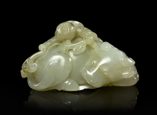 A White Jade Model of a Buffalo having