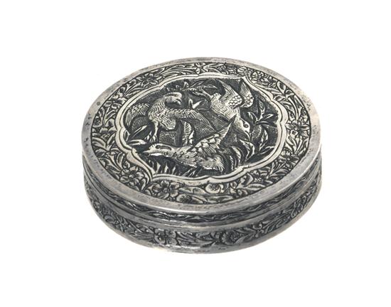 A Chinese Repousse Decorated Silver