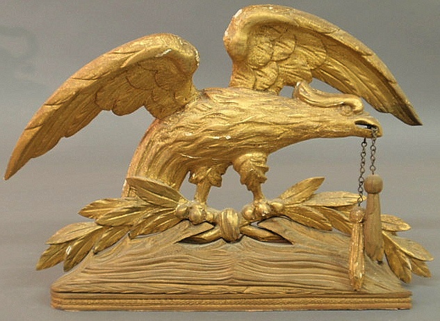 Gilt carved spread-winged eagle early