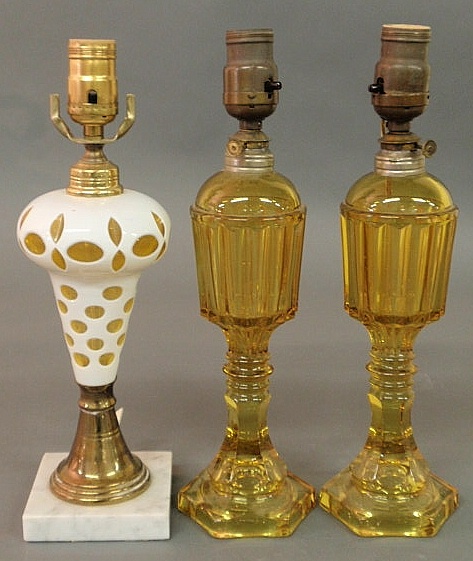 Pair of amber glass fluid lamps