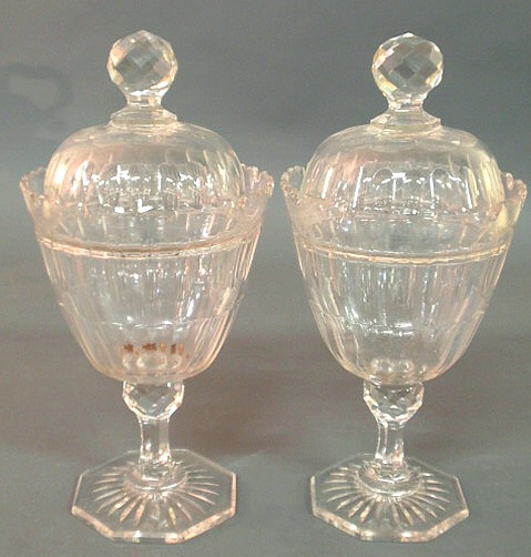 Pair of crystal glass covered urns