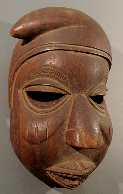 Carved African head mask. 18"h.x12"w.