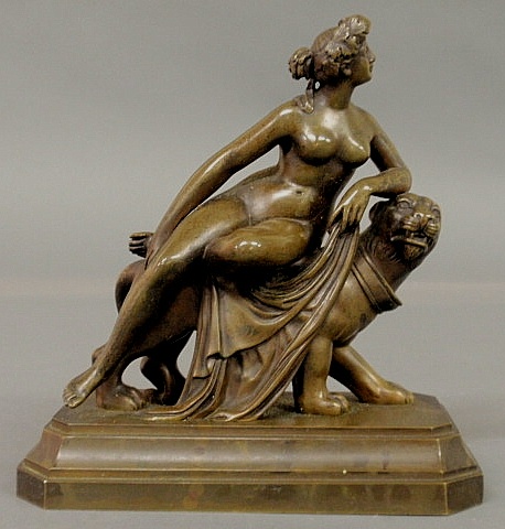 Bronze figure of a nude woman reclining