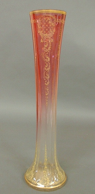 Tall cranberry glass vase with gilt