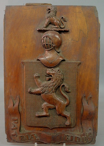 Carved mahogany armorial crest