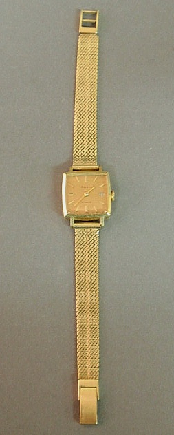 Ladies Bulova Automatic 18k gold wristwatch