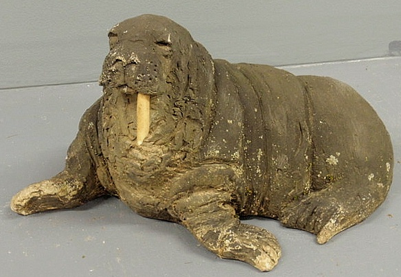 Cast plaster walrus garden ornament