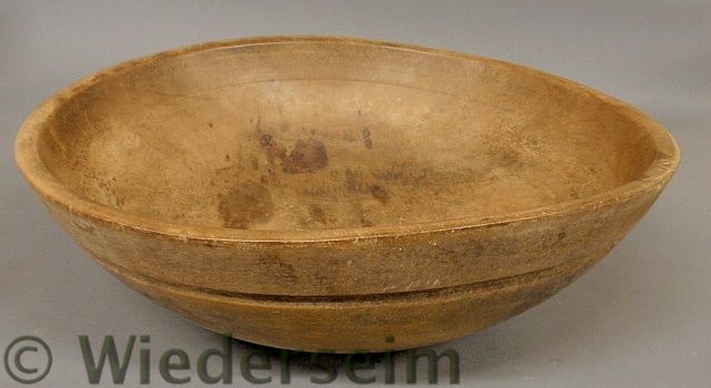 Carved wood bowl. 19.75diam.