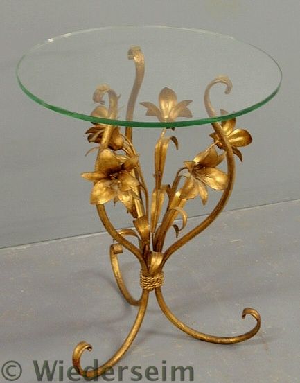 Gilt metal side table with a spray of