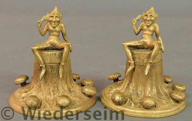 Pair of unusual bronze inkwells