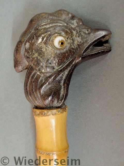 Carved rooster head walking stick