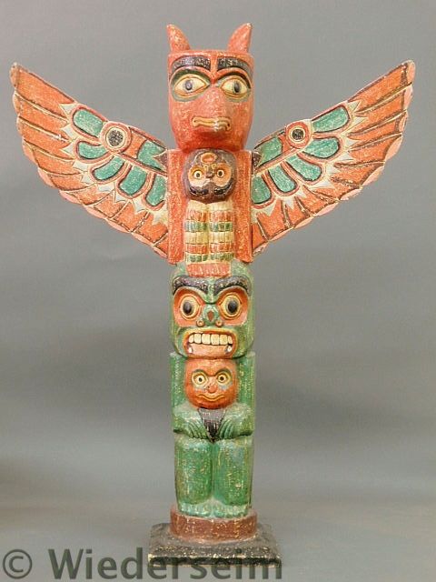 Carved Northwest Indian totem pole