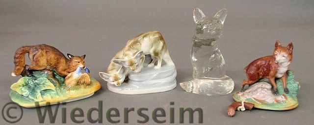 Clear glass fox figure and three 157599