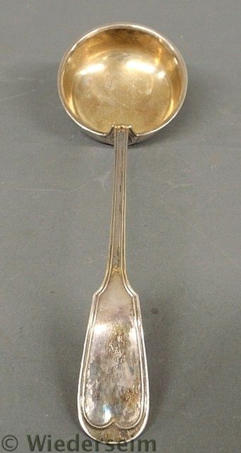 Silver ladle in a Colonial pattern marked