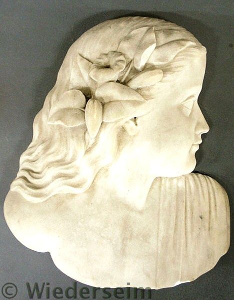 Relief carved marble side profile