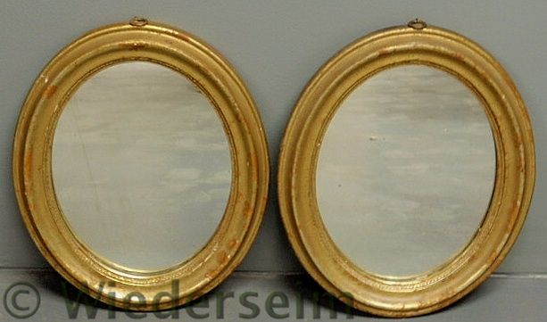 Small pair of oval gilt decorated